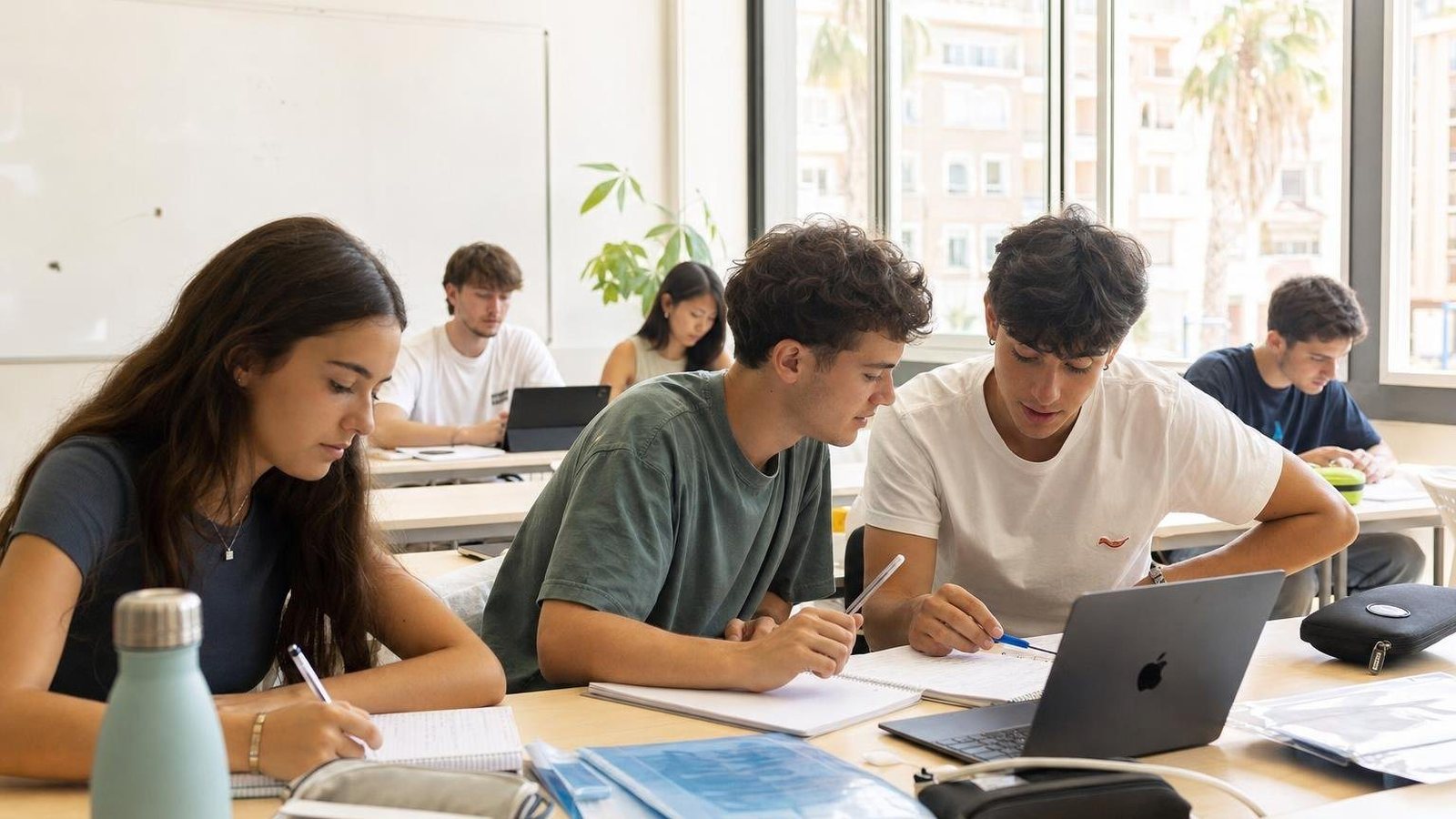 Illustrative group of university students working together